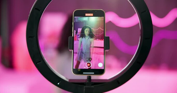 Girl, dancing and vlogging on live stream for social media, connection or audience for online. Female person, gen z and bedroom with phone screen for content creation and tech at home for website