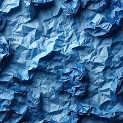 Fototapeta premium A crumpled blue paper texture filling the entire frame