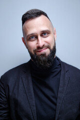 Obraz premium Studio portrait of young handsome man with beard.