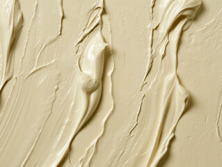 Close-Up of Swirled Beige Cream or Cosmetic Texture