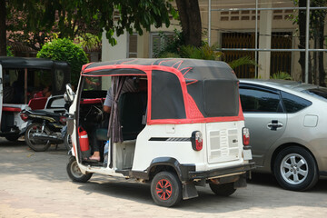Fototapeta premium cars on the street of Siem Reap, Cambodia