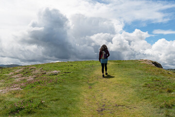 Hiker walking along the Asturian Western Coast