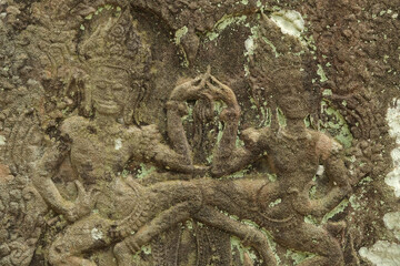 ancient bas-reliefs on the Angkor Wat temple, Cambodia