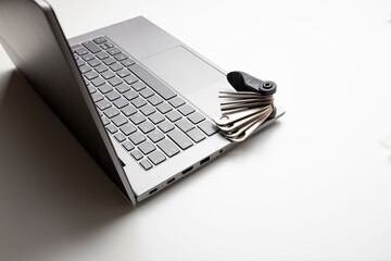 Laptop with the tool. Concept of repair