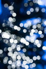 White bokeh with blue background