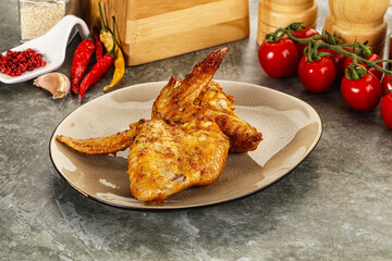 Tasty roasted chicken wing with spices