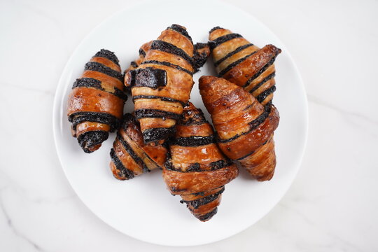 Delicious fresh baked Rugelach with chocolate filling on plate