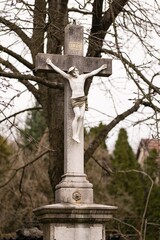 Statue of Jesus Christ with INRI text, vertical image