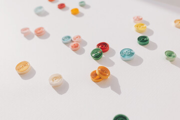 Paper quilling,colorful paper circles. abstract background. Colored strips of paper. Hand made of paper quilling technique. selective focus