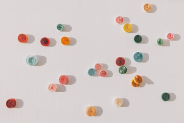 Paper quilling,colorful paper circles. paper abstract background. Colored strips of paper. Hand made of paper quilling technique. top view