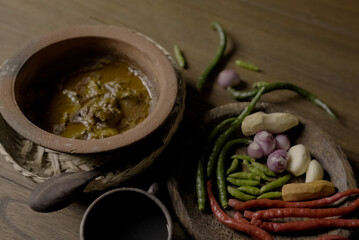 Indonesian food is placed along with its ingredients and spices