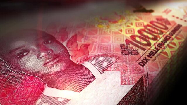 Guinea money Guinean francs counting. GNF 10000 banknotes. Fast cash note count macro loop. Business, finance and economy. Loopable and seamless concept.