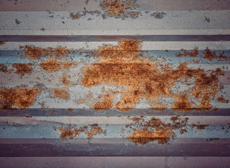 abstract background texture.The surface of the rusted steel.orange  color on material.Weathered old zinc fence