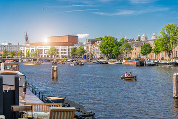 Panoramic autumn view of Amsterdam city. Famous Dutch channels and great cityscape. Colorful...