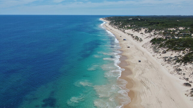 Drone, Christmas day, 4x4 driving (4WD) on Preston Beach, just south of Perth, Western Australia. Camp, swim and eat. Turquoise colored water, white sand dunes 