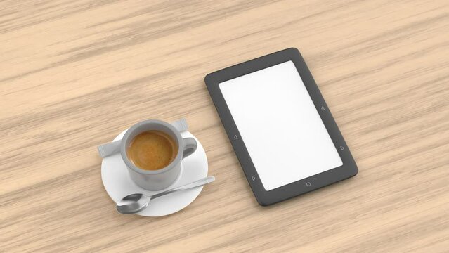 E-book reader with blank display and espresso coffee on a wooden table