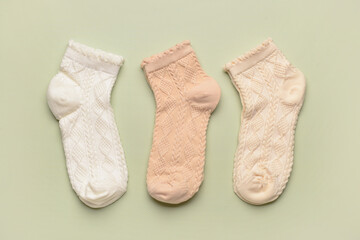 Basic color socks on green background