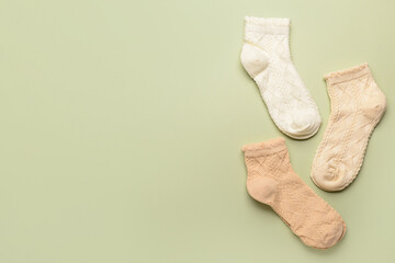 Basic color socks on green background
