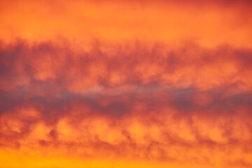 Sunset sky, clouds painted in bright colors over Kyiv