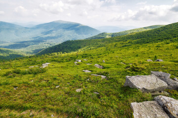 beautiful scenery of mountainous countryside in summer. view in to the distant valley. outdoor...
