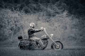 Black and white artistic photo of a classic american chopper style motorcycle