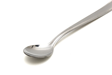 Metal large spoon in white background