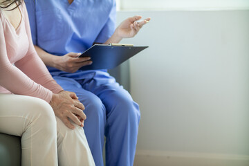 An elderly woman undergoes an annual health examination because she need health examination documents apply for health and life insurance. doctor is examining body of an elderly woman check her health