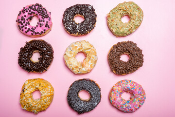 Various delicious donuts with different sprinkled decorations
