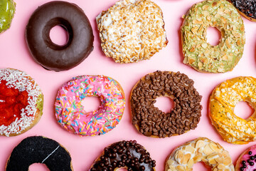 Various delicious donuts with different sprinkled decorations