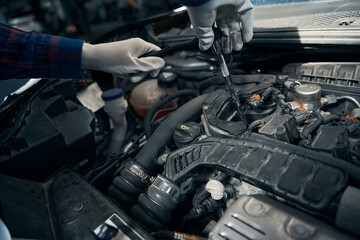 Close up photo of man working with tool