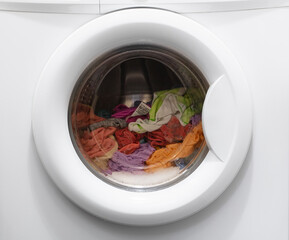 closeup of laundry spinning in washing machine