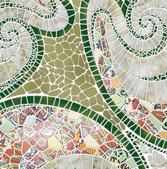 Mosaic in muted colors on a white background.