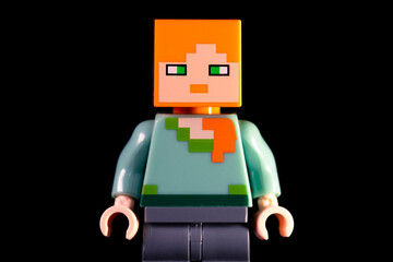 Naklejka premium LEGO Minecraft woman with red hair and green eyes