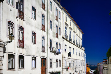 Lisbon, Portugal May 2024: charming old buildings in the Graça neighbourhood with a view over the historic alfama district to the tagus river