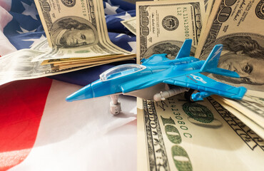 Military toy airplane jet aircraft - fighter isolated on usa flag background