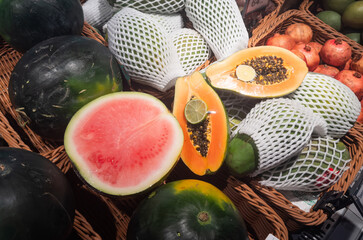 Many ripe tasty tropical fruits close up