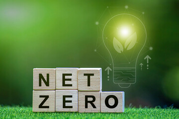 net zero carbon dioxide reduction concept. 3D green target symbol on Net Zero, text on pyramid...