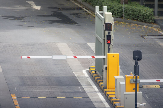 car park barrier with recoding CCTV camera, automatic entry system.