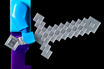 Naklejka premium LEGO Minecraft sword in the hands of a mob