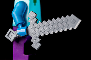 Naklejka premium LEGO Minecraft sword in the hands of a mob