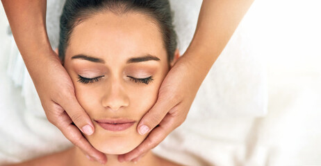 Face, hands for massage and woman in spa with masseuse to relax for health, peace or wellness....