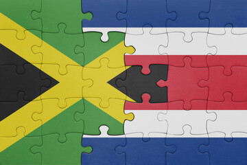 puzzle with the colourful national flag of costa rica and flag of jamaica .