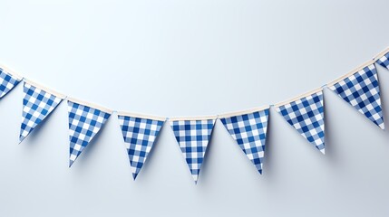 Blue and white gingham bunting banner hanging on a white wall.