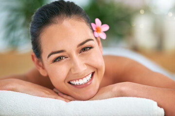 Happy, massage and smile with woman in spa to relax for health, natural wellness or peace. Beauty,...