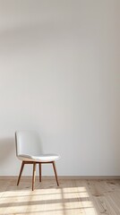 Minimalist interior with a single white chair against a blank wall. Wooden flooring adds warmth, while light creates a serene ambiance.