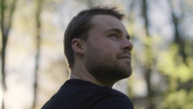 Portraits of an instrospective man in the woods