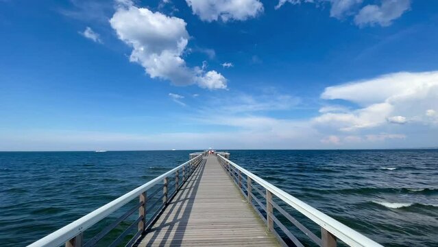 wooden pier in the sea in summer