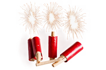 Set of red firecrackers with lit fuses and sparks shot against a transparent, white background, png