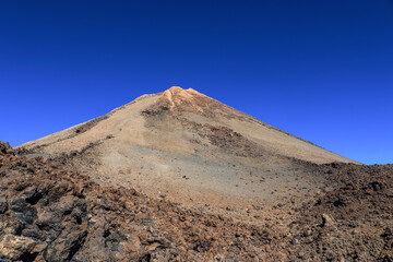 View of the impressive Mount Theide on Tenerife in its rocky surroundings.