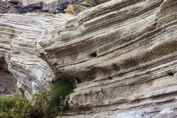 Piled up geological rock formations on the beach of Tenerife.